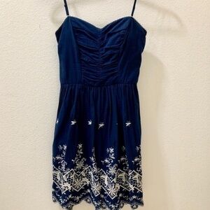 Elegant Navy Blue Mini Dress with Embroidered Hem